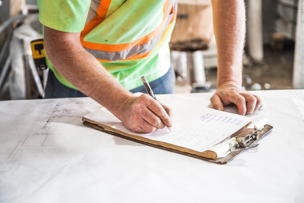 Civil Engineer Signing Documents